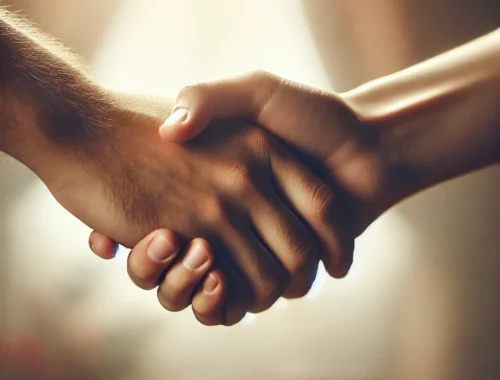 Amar os Inimigos: Uma Perspectiva Espiritual 6 Amar os inimigos. Duas pessoas apertando as mãos em sinal de perdão e reconciliação, inspiradas no ensinamento de Jesus